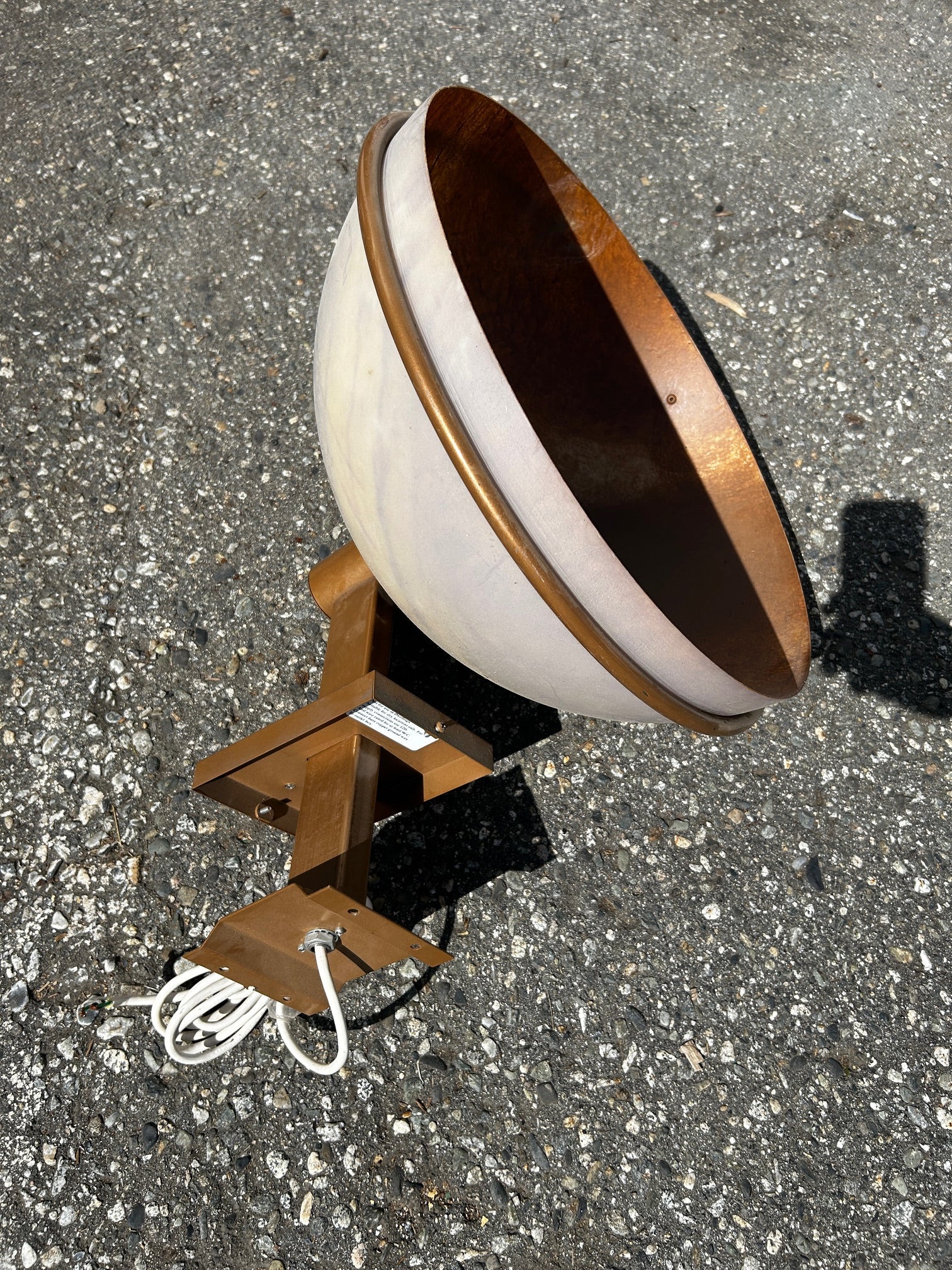 Old gold painted outdoor wall sconces with acrylic dome shades